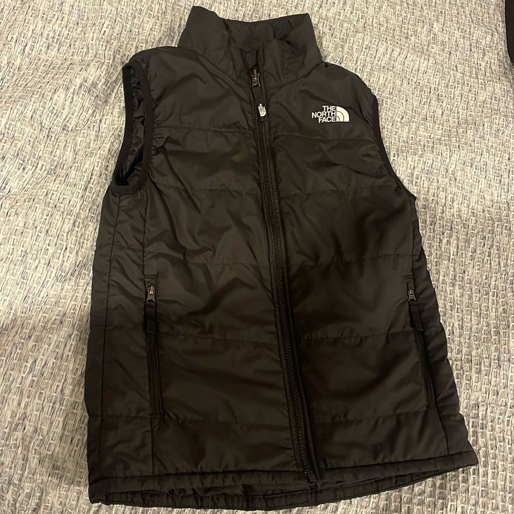 The north face black puffer vest